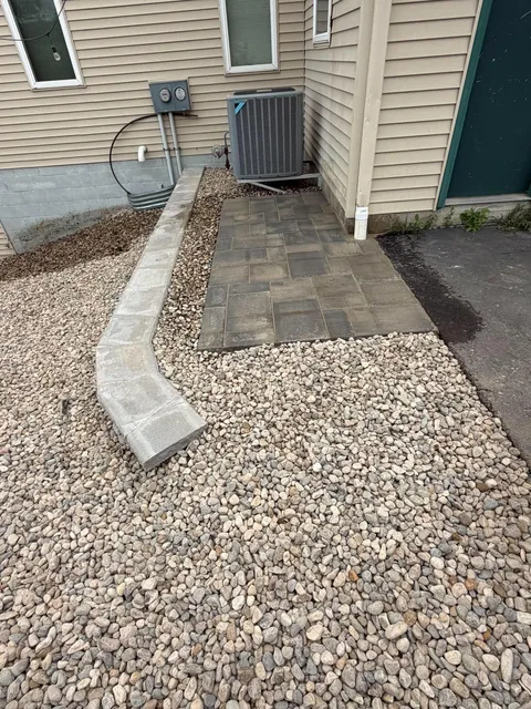 paver walkway and retaining wall installed